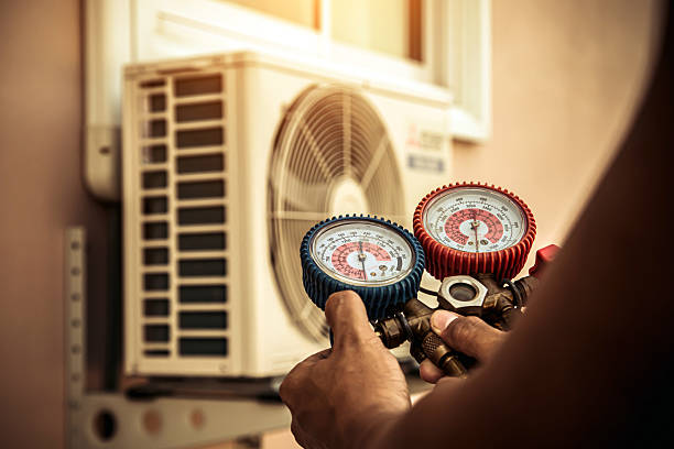 Professional Heat Pump Repair technician working in Mukwonago, WI